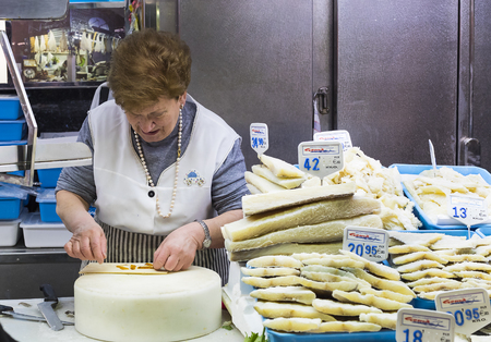 BARCELONA, SPAIN - 11 JANUARY 2018: The old grocery market of Barcelona Boqueria selling food jamon vegetables for tourists and visitors to the city.のeditorial素材