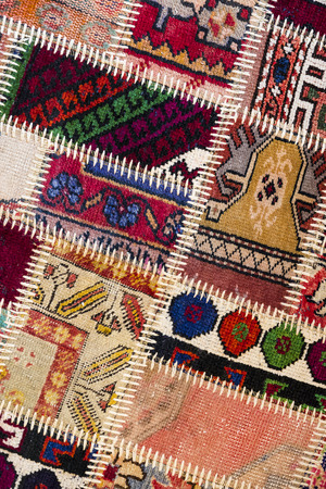 Background of an old worn carpet.の写真素材