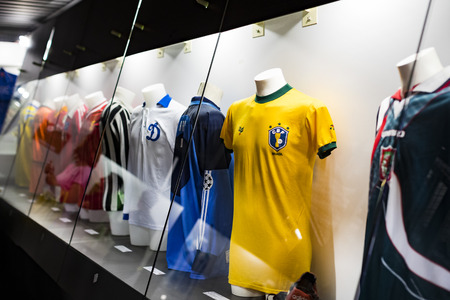 6 JUNE 2018, MILAN, ITALY: The museum is famous for players of football clubs. Inter Milan and Milan T-shirts at the San Siro stadium.のeditorial素材