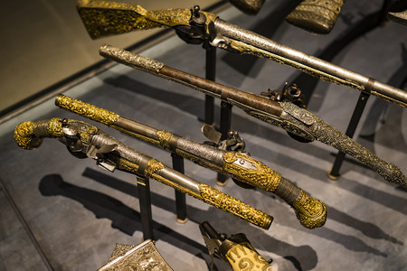 4 JUNE 2018, MILAN, ITALY: Museum of the Poldis Pezzoli Knights' Hall with samples of medieval weapons and ammunitionのeditorial素材
