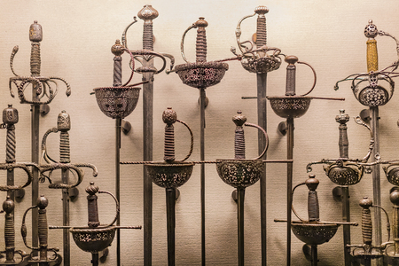 4 JUNE 2018, MILAN, ITALY: Museum of the Poldis Pezzoli Knights' Hall with samples of medieval weapons and ammunitionのeditorial素材