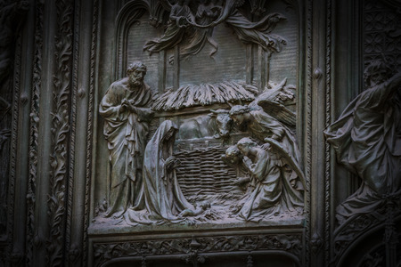 2 JUNE 2018, MILAN, ITALY: The door of the central entrance of the Duomo of Milan with elements of the life of Jesus.のeditorial素材