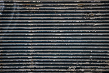 Background of rusty metal with irradiated paintの写真素材