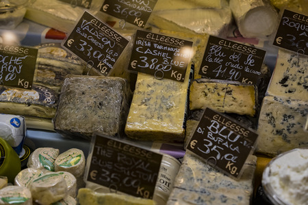 7 JUNE 2018, MILAN, ITALY: Showcases and shelves of the Wagner Market in Milan with many kinds of...