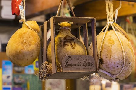 7 JUNE 2018, MILAN, ITALY: Showcases and shelves of the Wagner Market in Milan with many kinds of cheeses.のeditorial素材