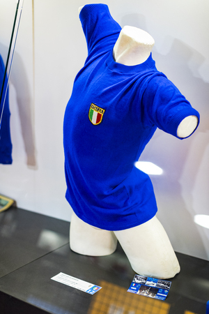 6 JUNE 2018, MILAN, ITALY: The museum is famous for players of football clubs. Inter Milan and Milan T-shirts at the San Siro stadium.のeditorial素材