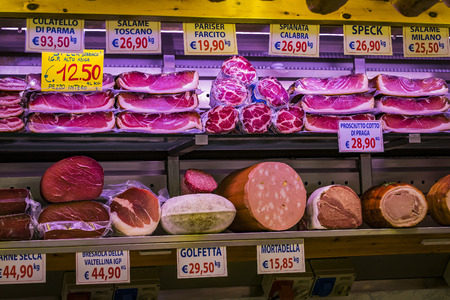 7 JUNE 2018, MILAN, ITALY: Showcases and shelves of the Wagner Market in Milan with many with assortment of cheeses, meat, vegetables and seafoodのeditorial素材
