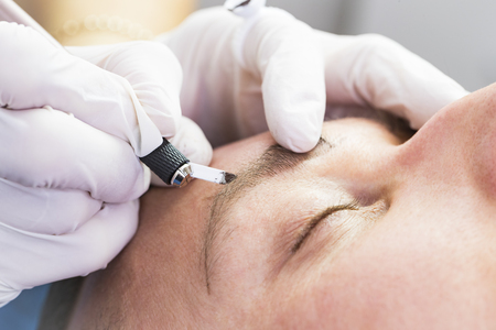 Microblading eyebrows workflow in a beauty salonの写真素材