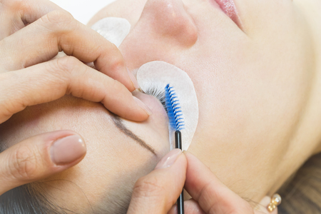 The process of eyelash extensions in the beauty salon