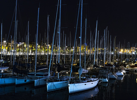 Yachts in the night port in Catalonia in Barcelona.の写真素材