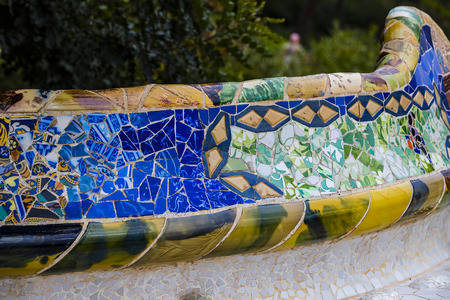 BARCELONA, SPAIN - 13 JANUARY 2018: Elements of mosaic fragments Gaudi's mosaic work in Park Guell in the winter in the city of Barcelona.のeditorial素材