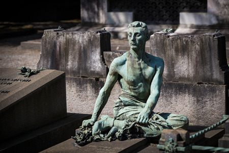 MILAN, ITALY - JUNE 6, 2018: Statues of mourning in Milan.のeditorial素材
