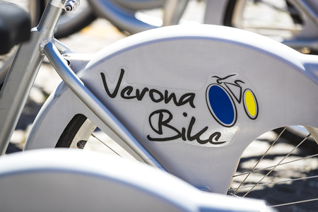 VERONA, ITALY - 4 SEPTEMBER: Street bike rental place in Verona. Italy.のeditorial素材