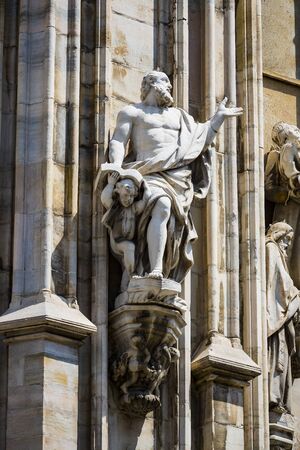 2 JUNE 2018, MILAN, ITALY: Sculptures of saints and martyrs decorating the Cathedral of Milan (Duomo di Milano) are shot closeup.のeditorial素材