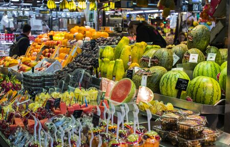 BARCELONA, SPAIN - 11 JANUARY 2018: The old grocery market of Barcelona Boqueria selling food jamon vegetables for tourists and visitors to the city.のeditorial素材