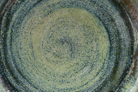 Background of old pottery with molds of mint