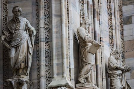 2 JUNE 2018, MILAN, ITALY: Sculptures of saints and martyrs decorating the Cathedral of Milan (Duomo...