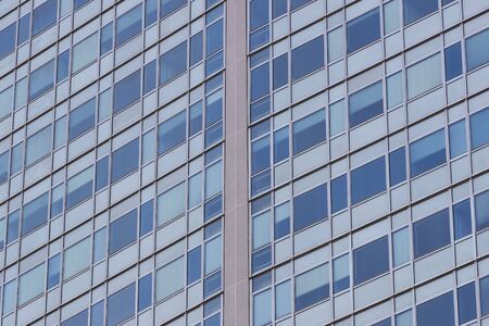 Background of the windows and balconies of the multi-storey building.