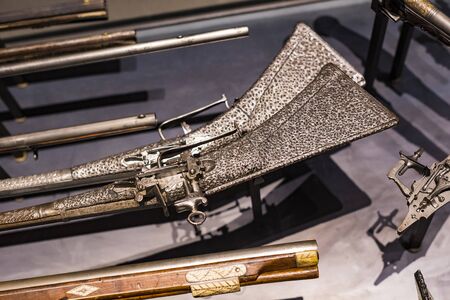 4 JUNE 2018, MILAN, ITALY: Museum of the Poldis Pezzoli Knights' Hall with samples of medieval weapons and ammunitionのeditorial素材