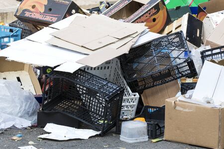 2 JUNE 2018, MILAN, ITALY: Garbage remains on the street at the site of the street market in the city of Milan.のeditorial素材