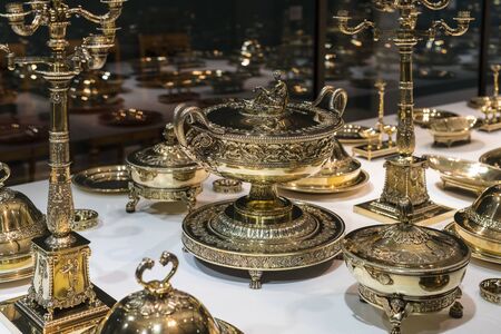 MUNICH, GERMANY - NOVEMBER 27, 2018: Crockery and cutlery sets from the Bavarian Kings collection in the museum residenz (Munich Residenz)のeditorial素材