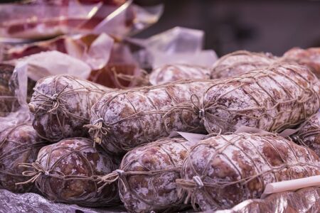 6 JUNE 2018, MILAN, ITALY: Shop of meat and cheese delicacies from traditional Italian products (il...