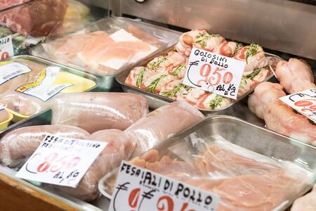 6 JUNE 2018, MILAN, ITALY: Shop of meat and cheese delicacies from traditional Italian products (il Macellaio Fattoria Del Casaro) in Milan Italy.のeditorial素材