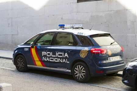 MADRID, SPAIN - MARCH 27, 2018: Police on the streets of the city watching the orderのeditorial素材