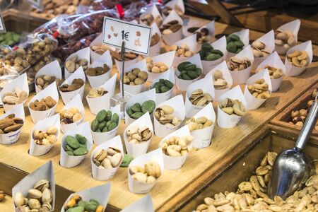 MADRID, SPAIN - 26 MARCH, 2018: The tourist attraction of the city is San Miguel counters with popular Spanish food.のeditorial素材