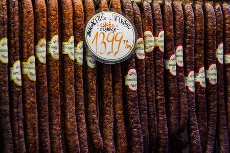 BUDAPEST, HUNGARY - JULY 17, 2017: The big central market of Budapest, a place of visiting of tourists for purchases of sausages of a paprika of souvenirs.のeditorial素材
