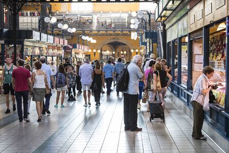 BUDAPEST, HUNGARY - JULY 17, 2017: The big central market of Budapest, a place of visiting of tourists for purchases of sausages of a paprika of souvenirs.のeditorial素材