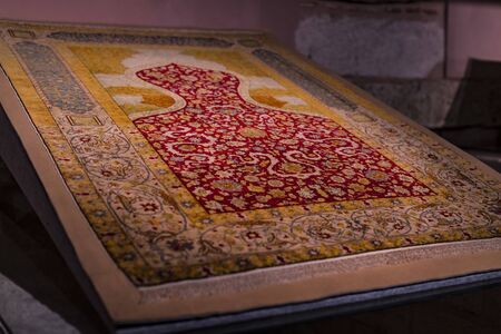 ISTANBUL, TURKEY - APRIL 5, 2017: Museum collection of traditional preserved of ancient old carpets...