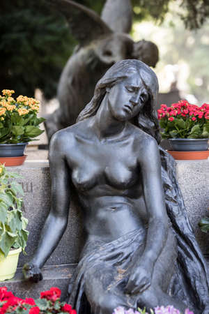 MILAN, ITALY - JUNE 6, 2018: Statues of mourning in Milan.のeditorial素材