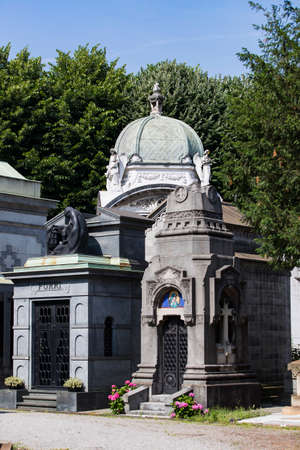 MILAN, ITALY - JUNE 6, 2018: Statues of mourning in Milan.のeditorial素材