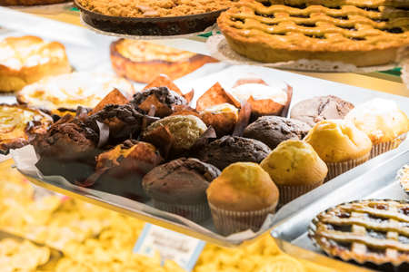 7 JUNE 2018, MILAN, ITALY: Showcases and shelves of the Wagner Market in Milan with many kinds of...