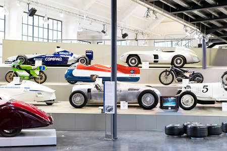 Collection of old and new cars in a museum