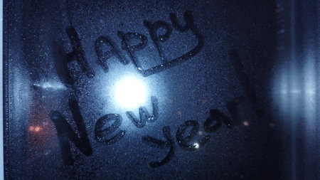 the inscription on the glass "Happy New Year"の写真素材