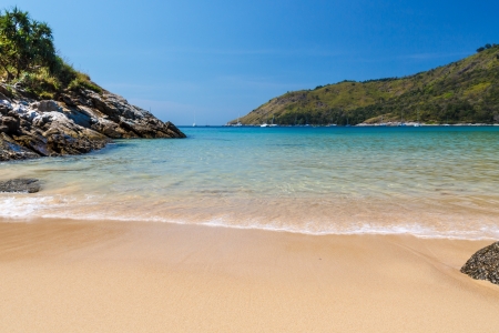  Sand and rock view of Nai Harn Beach, Phuket, Thailand. 	Sand and rock view of Nai Harn Beach, Phuket, Thailand. の写真素材