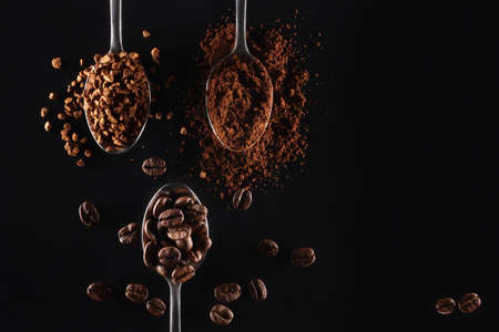 Cup of coffee in coffee beansの写真素材