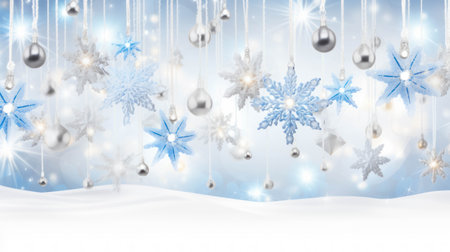 Blue winter background with snowdrift and hanging snowflakes and Christmas decorations. Space for your text.の素材