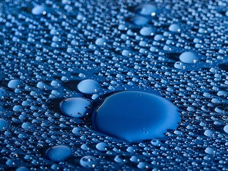 Water drops on blue background.