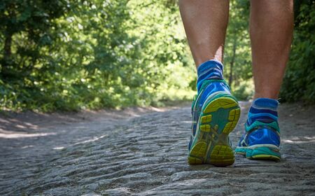 Runner on a countryside road.
