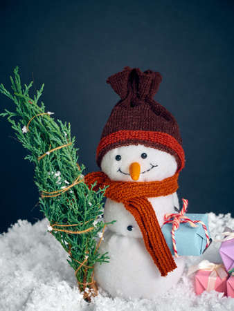 Christmas background with toy snowman.の写真素材