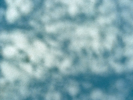 Rough wall with dark shadows.