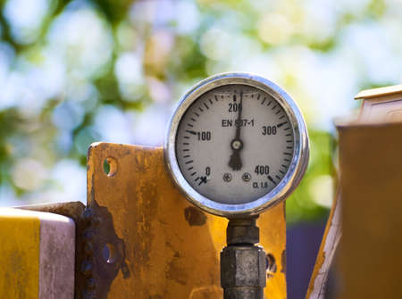 Analog pressure gauge shows pressure