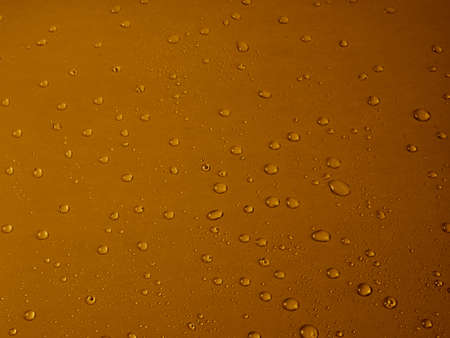 Random water drops on the blue PVC surfaceの写真素材