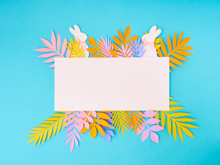 Easter greeting card. Paper blank on blue background. Flat lay, top view, copy space.の写真素材