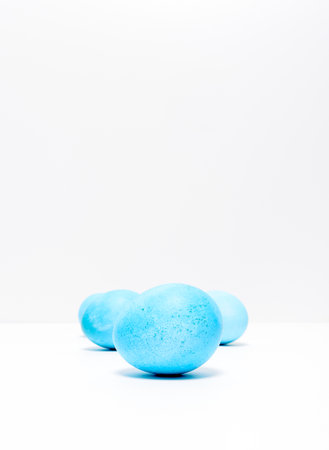 Easter eggs on white background. Easter concept. Copy space.の写真素材