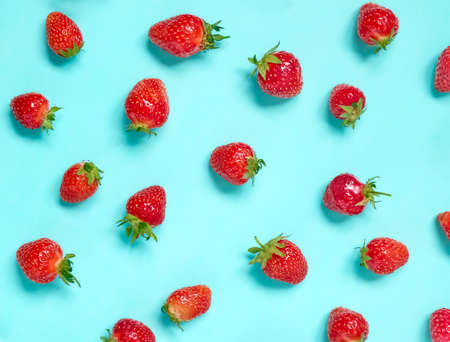 Fresh strawberry pattern on blue background.の写真素材