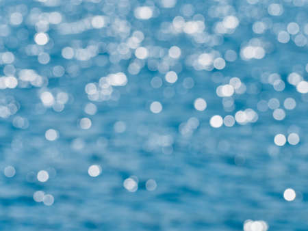 Background of bokeh on surface water.の写真素材